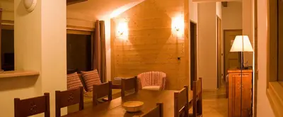Coin salon dans l'établissement Madame Vacances Résidence Les Jardins de la Vanoise