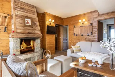 Coin salon dans l'établissement Chalet de l'Ours
