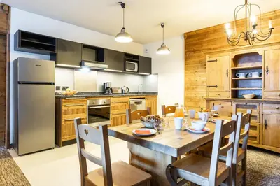 Cuisine ou kitchenette dans l'établissement Chalet de l'Ours