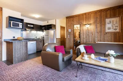 Cuisine ou kitchenette dans l'établissement Chalet Altitude Les Arcs 2000