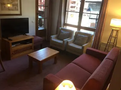 Télévision ou salle de divertissement dans l'établissement Les Arcs 1950 - appartement 6 pers.