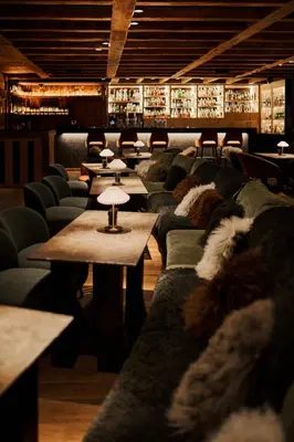 Coin salon dans l'établissement Les Suites – Maison Bouvier