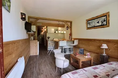Télévision ou salle de divertissement dans l'établissement ARC 1800 Pierra Menta