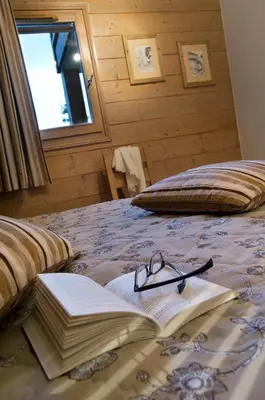 Un ou plusieurs lits dans un hébergement de l'établissement CGH Résidences & Spas Les Fermes de Ste Foy