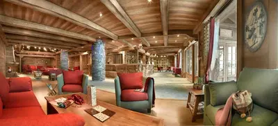 Coin salon dans l'établissement CGH Résidences & Spas Les Fermes de Ste Foy