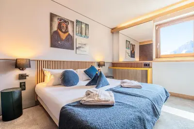 Un ou plusieurs lits dans un hébergement de l'établissement Hôtel Club MMV Altitude