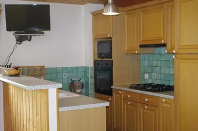 Cuisine ou kitchenette dans l'établissement Le Tchou