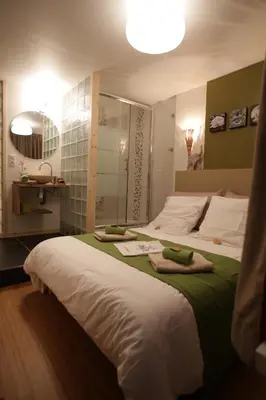 Un ou plusieurs lits dans un hébergement de l'établissement ARC 1800 Appartement 4 pièces Lauzières skis aux pieds