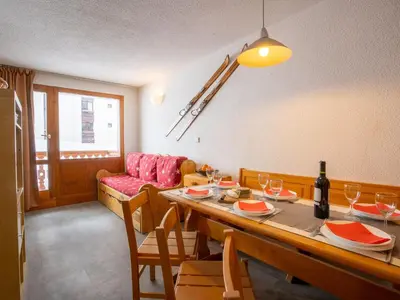 Coin salon dans l'établissement Apartment Le Hameau du Borsat - Val Claret-9 by Interhome