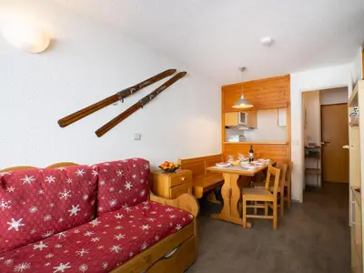 Coin salon dans l'établissement Apartment Le Hameau du Borsat - Val Claret-9 by Interhome