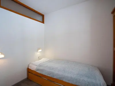 Un ou plusieurs lits dans un hébergement de l'établissement Apartment Le Hameau du Borsat - Val Claret-9 by Interhome