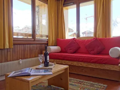 Coin salon dans l'établissement Apartment Les Grandes Balmes I et II - Le Lac-9 by Interhome