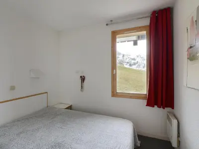 Un ou plusieurs lits dans un hébergement de l'établissement Appartement confort 6 pers. au pied des pistes, animaux acceptés - FR-1-181-982