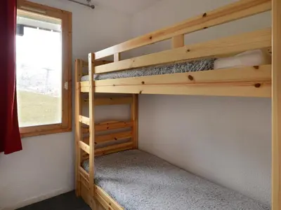 Un ou plusieurs lits dans un hébergement de l'établissement Appartement confort 6 pers. au pied des pistes, animaux acceptés - FR-1-181-982