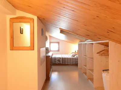 Un ou plusieurs lits dans un hébergement de l'établissement Appartement rénové, cœur de station, balcon avec vue, 4 pers - FR-1-181-1037