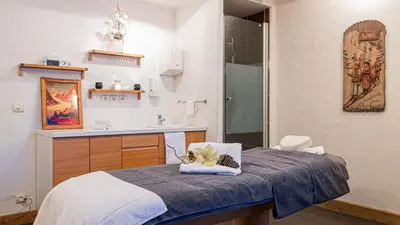 Un ou plusieurs lits dans un hébergement de l'établissement Hôtel Carlina by Les Etincelles