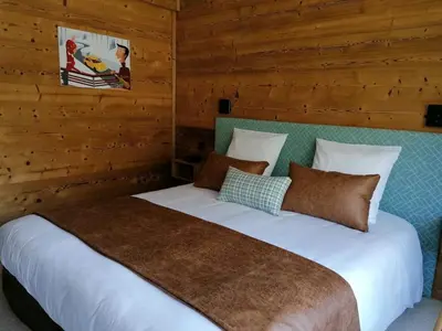 Un ou plusieurs lits dans un hébergement de l'établissement Hotel L'Edelweiss