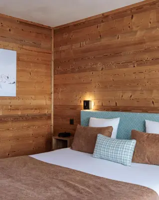 Un ou plusieurs lits dans un hébergement de l'établissement Hotel L'Edelweiss