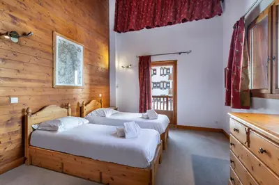 Un ou plusieurs lits dans un hébergement de l'établissement Les Suites du Val Claret by ExplorHome