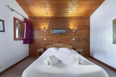 Un ou plusieurs lits dans un hébergement de l'établissement Les Suites du Val Claret by ExplorHome