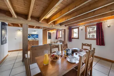 Télévision ou salle de divertissement dans l'établissement Les Suites du Val Claret by ExplorHome