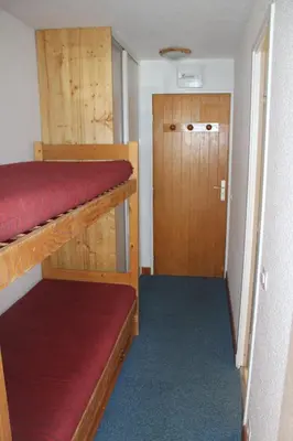 Un ou plusieurs lits dans un hébergement de l'établissement Studio cabine double balcon Tignes val claret ouvert toute l année
