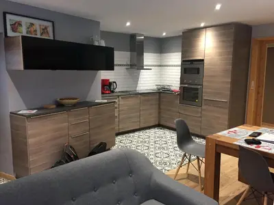 Cuisine ou kitchenette dans l'établissement Le Rocher