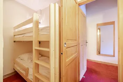 Un ou plusieurs lits dans un hébergement de l'établissement Arc1950 Auberge Jérôme