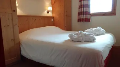 Un ou plusieurs lits dans un hébergement de l'établissement Les Alpages De Val Cenis