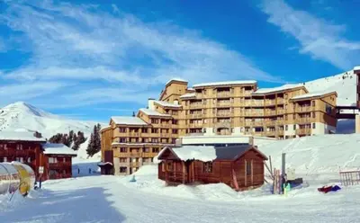 L'établissement Duplex skis aux pieds Belle Plagne en hiver