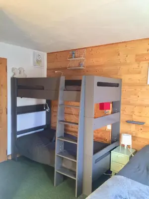 Un ou plusieurs lits dans un hébergement de l'établissement Duplex skis aux pieds Belle Plagne