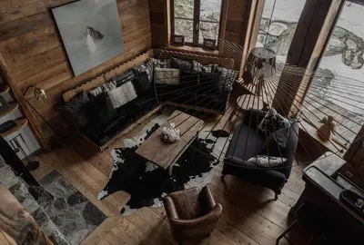 Coin salon dans l'établissement Chalet Lièvre Blanc - LES CHALETS COVAREL