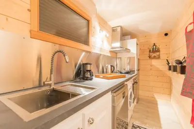 Cuisine ou kitchenette dans l'établissement La Coulée Douce