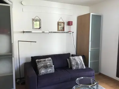 Coin salon dans l'établissement MyHome - Plein Soleil 47 - Studio cabine 4 pax skis aux pieds Val Claret