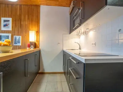 Cuisine ou kitchenette dans l'établissement Studio Le Grand Pré - Lavachet-5 by Interhome