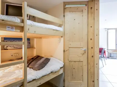 Un ou plusieurs lits dans un hébergement de l'établissement Studio Le Sefcotel - Val Claret-22 by Interhome