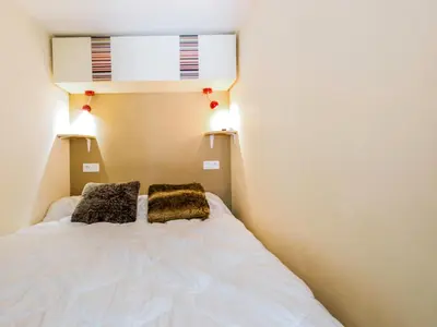 Un ou plusieurs lits dans un hébergement de l'établissement Studio Le Sefcotel - Val Claret-22 by Interhome