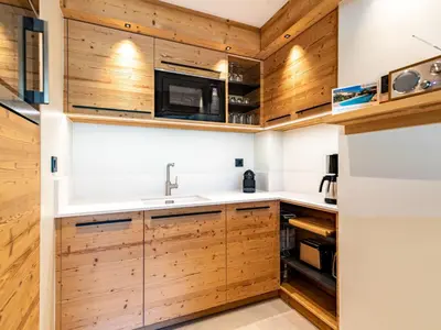 Cuisine ou kitchenette dans l'établissement Apartment Les Cimes - Le Lac by Interhome