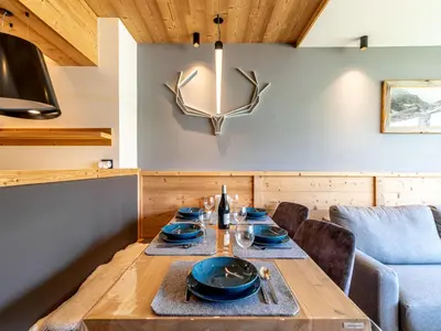 Coin salon dans l'établissement Apartment Les Cimes - Le Lac by Interhome