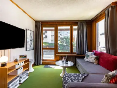 Télévision ou salle de divertissement dans l'établissement Apartment Le Pramecou - Val Claret-15 by Interhome