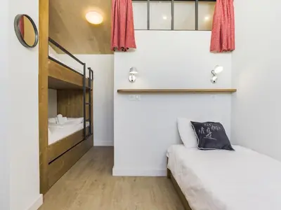 Un ou plusieurs lits dans un hébergement de l'établissement Apartment Les Hauts du Val Claret - Val Claret-21 by Interhome