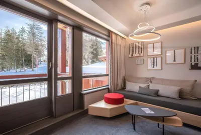 Coin salon dans l'établissement Altezza - Arc 1800 Hotel & Spa - ex Mercure