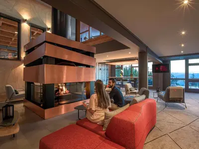 Coin salon dans l'établissement Altezza - Arc 1800 Hotel & Spa - ex Mercure