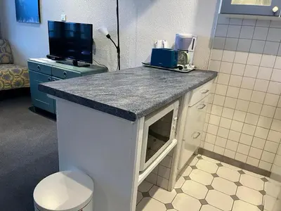 Cuisine ou kitchenette dans l'établissement Studio sud/ouest à Tignes avec accès ski et wifi - FR-1-449-73