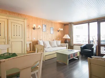 Coin salon dans l'établissement 2 pièces luxe, ski aux pieds, balcon sud/ouest - FR-1-449-98