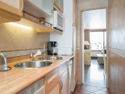 Cuisine ou kitchenette dans l'établissement 2 pièces luxe, ski aux pieds, balcon sud/ouest - FR-1-449-98