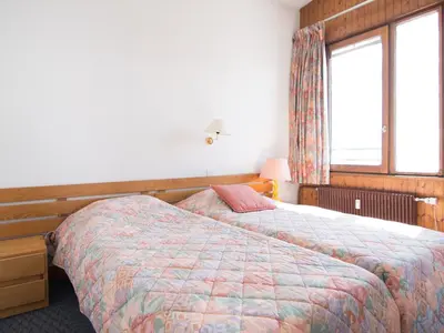 Un ou plusieurs lits dans un hébergement de l'établissement Tignes : Appartement 2 pièces avec wifi, proche pistes - FR-1-449-118