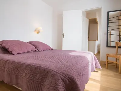 Un ou plusieurs lits dans un hébergement de l'établissement Deux pièces sud-ouest, balcon, WiFi gratuit, proche pistes à Tignes - FR-1-449-120