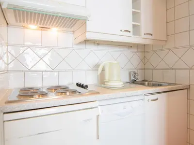 Cuisine ou kitchenette dans l'établissement Studio Sud-Ouest à 500m des pistes avec Wi-Fi, 4 couchages - FR-1-449-138