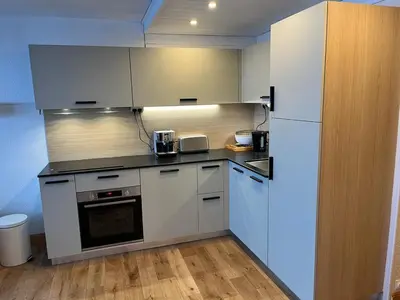 Cuisine ou kitchenette dans l'établissement Appartement Sud 41m² avec Wifi près des pistes à Tignes - FR-1-449-166